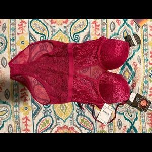 NWT never worn (obviously) or tied on. Deep rose lingerie.